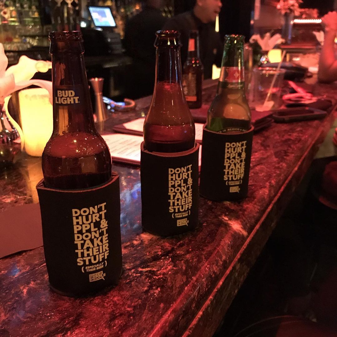 Don't Hurt People Beverage Koozie