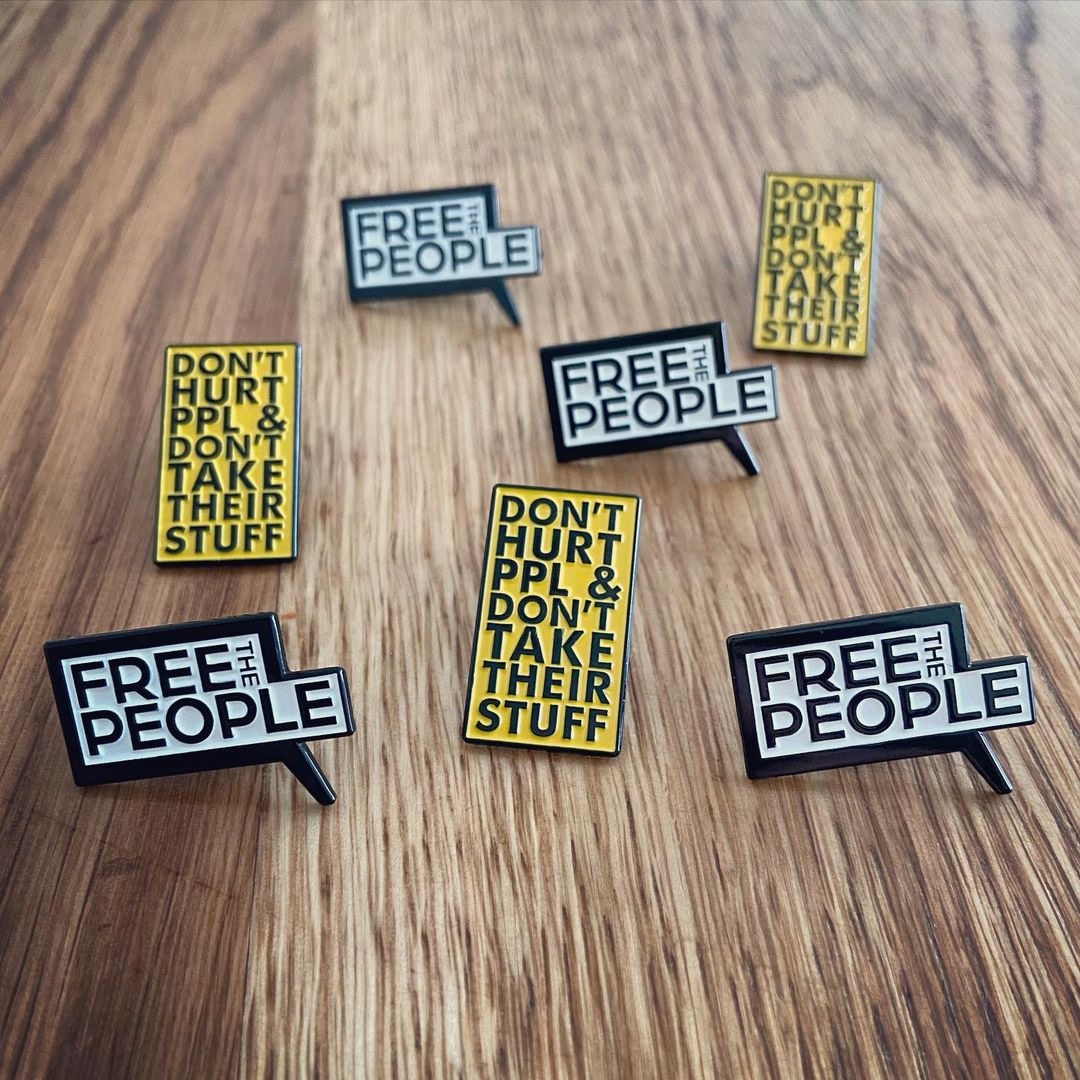 Free the People Enamel Pin